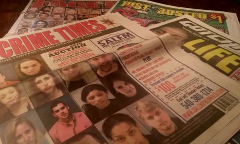 Behind-Busted-Newspapers